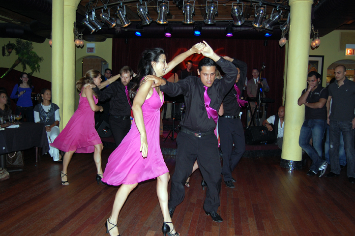 Salsa With Silvia owner Silvia Alexiev performs with her first very own performance team that she directed. Chicago 2008.